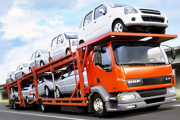 Перевозки легковых и грузовых автомобилей автовозом по России, цена доставки машин